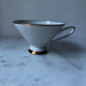 Elegant White floral Teacup with Gold Trim